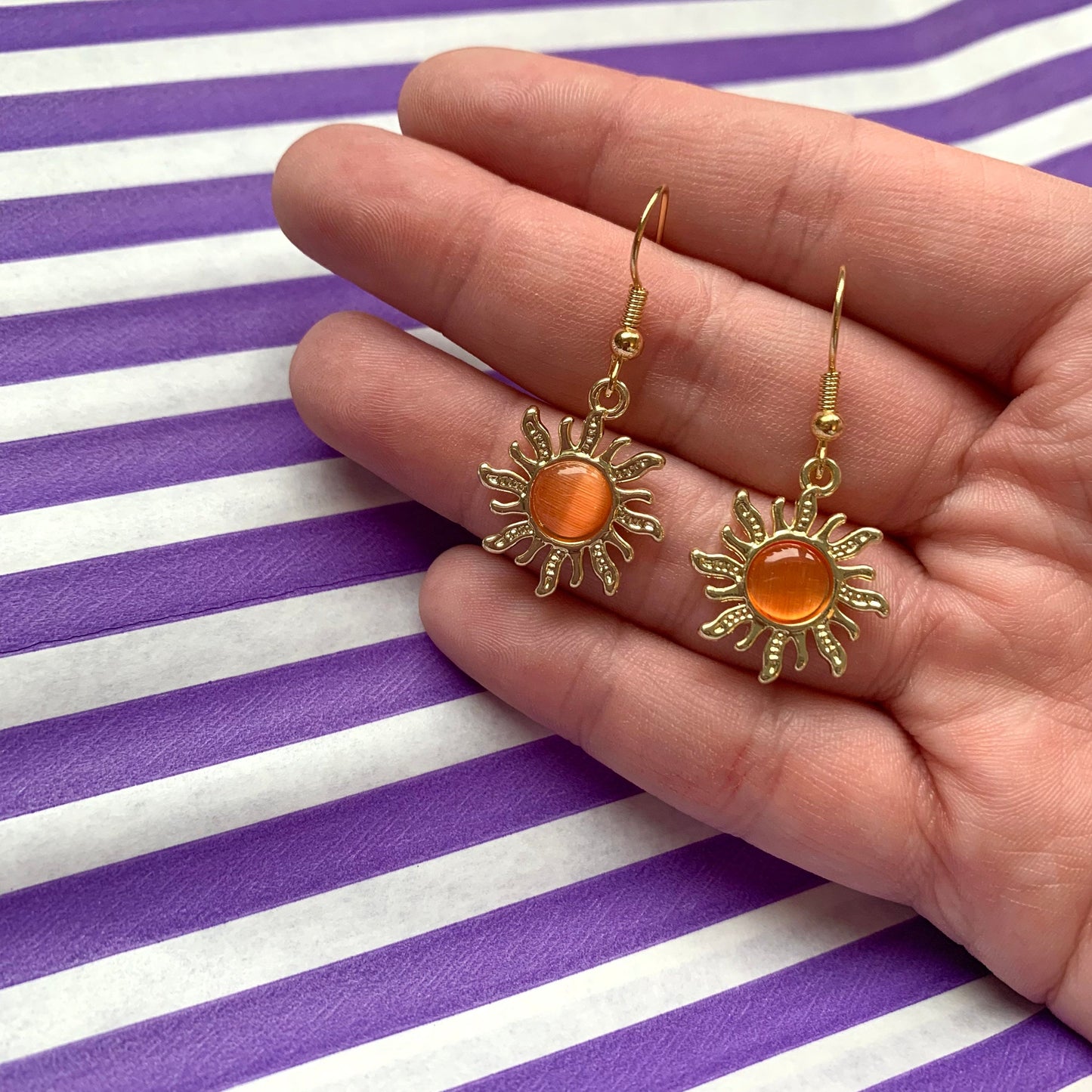 Cool quirky gold orange sun earrings with orange centre dangle earrings