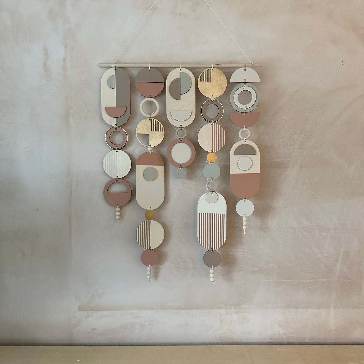 Modern Wall Art with Gold Metal Hoop Detailing and Blush Pink Accents