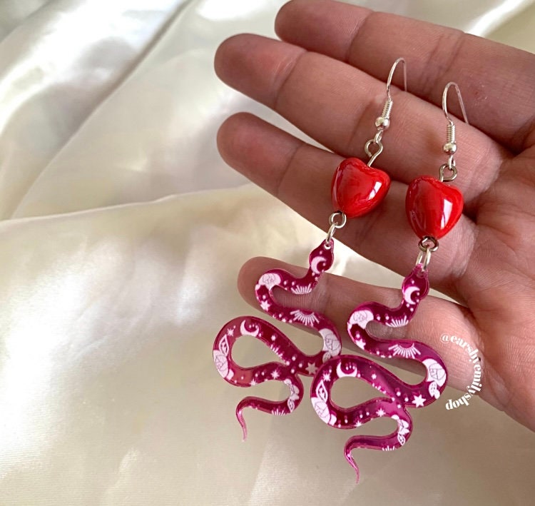 Cool quirky large statement pink acrylic snake earrings with ceramic red heart handmade drop dangle silver plated earrings
