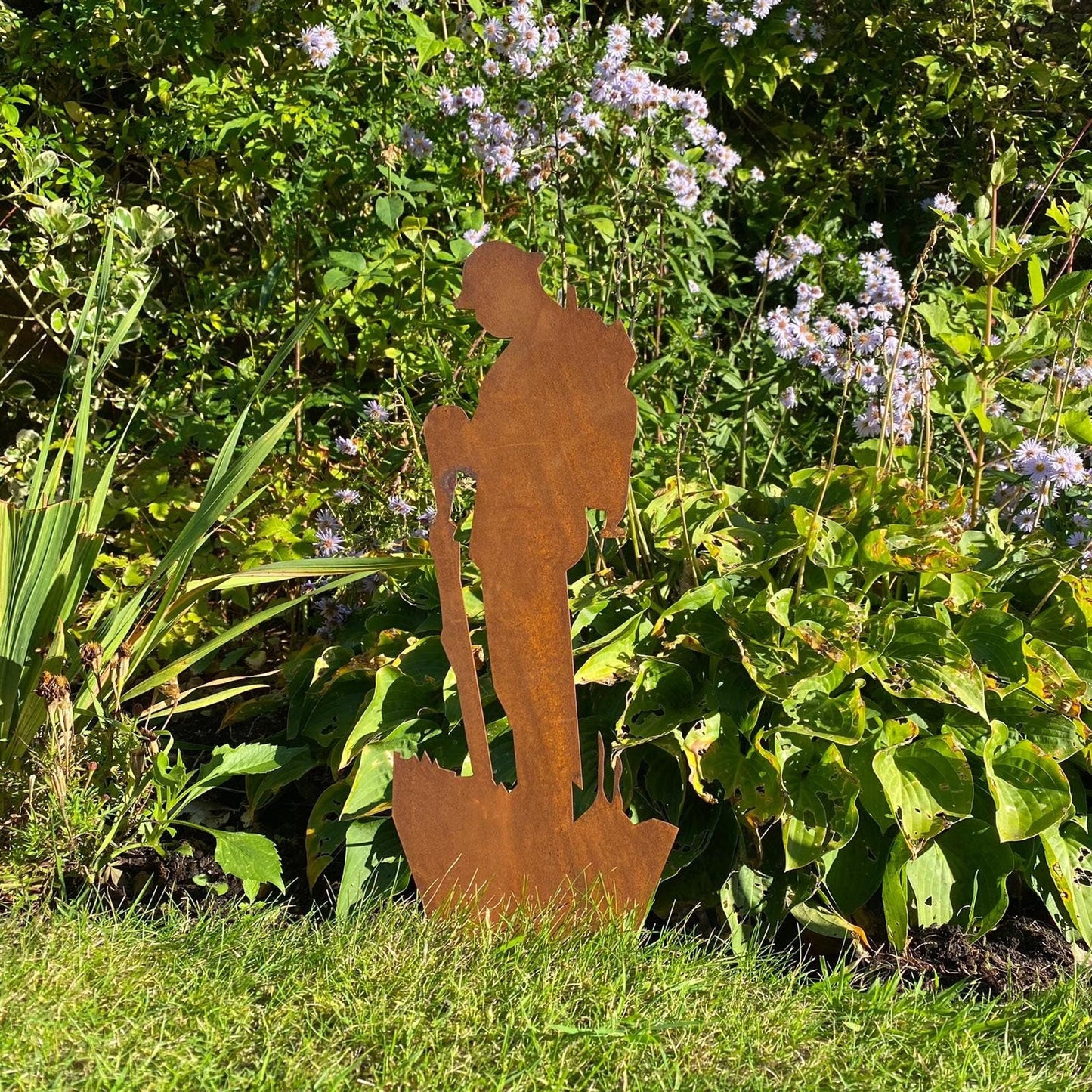 Small Rusty Metal Soldier Garden Statue