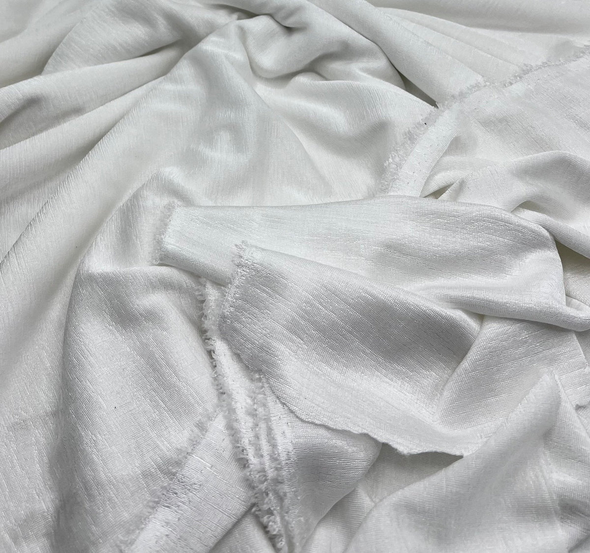 Ivory Acetate Slinky 4 Way Stretch Fabric