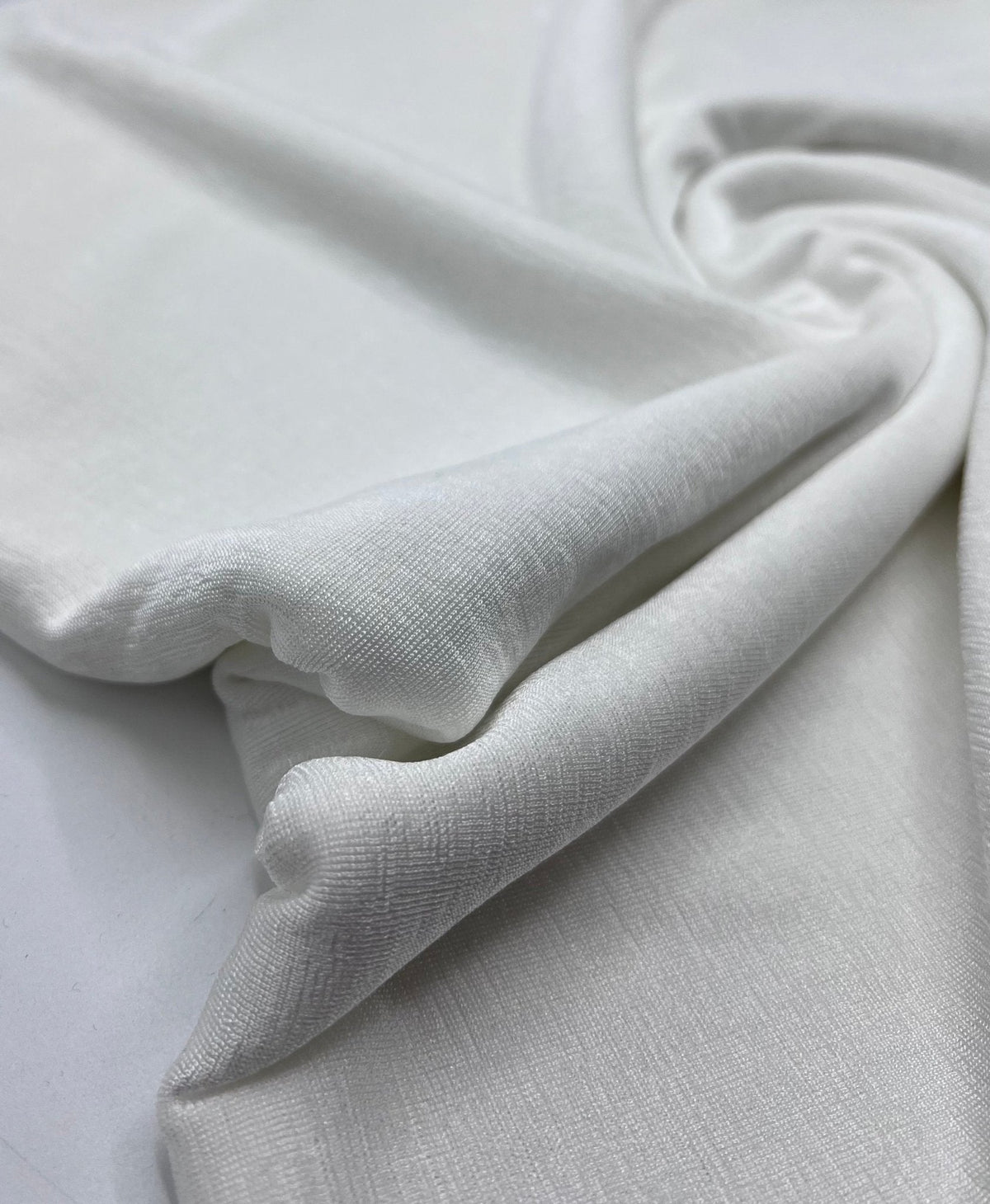 Ivory Acetate Slinky 4 Way Stretch Fabric