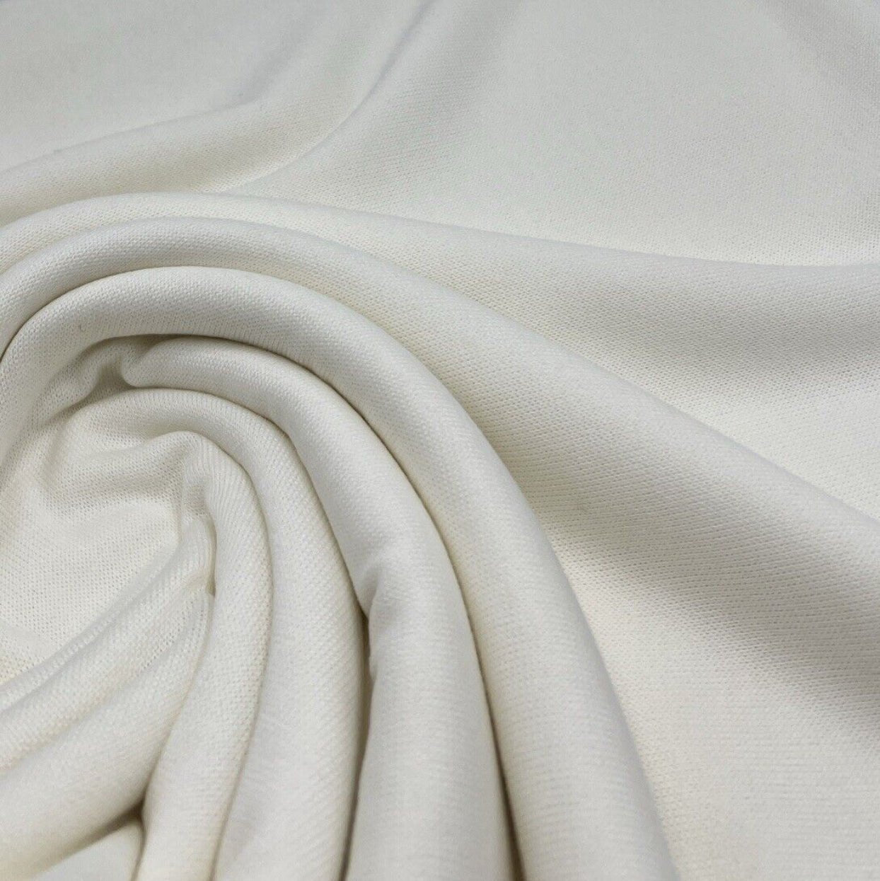 Ivory Melange Knit Stretch Fabric