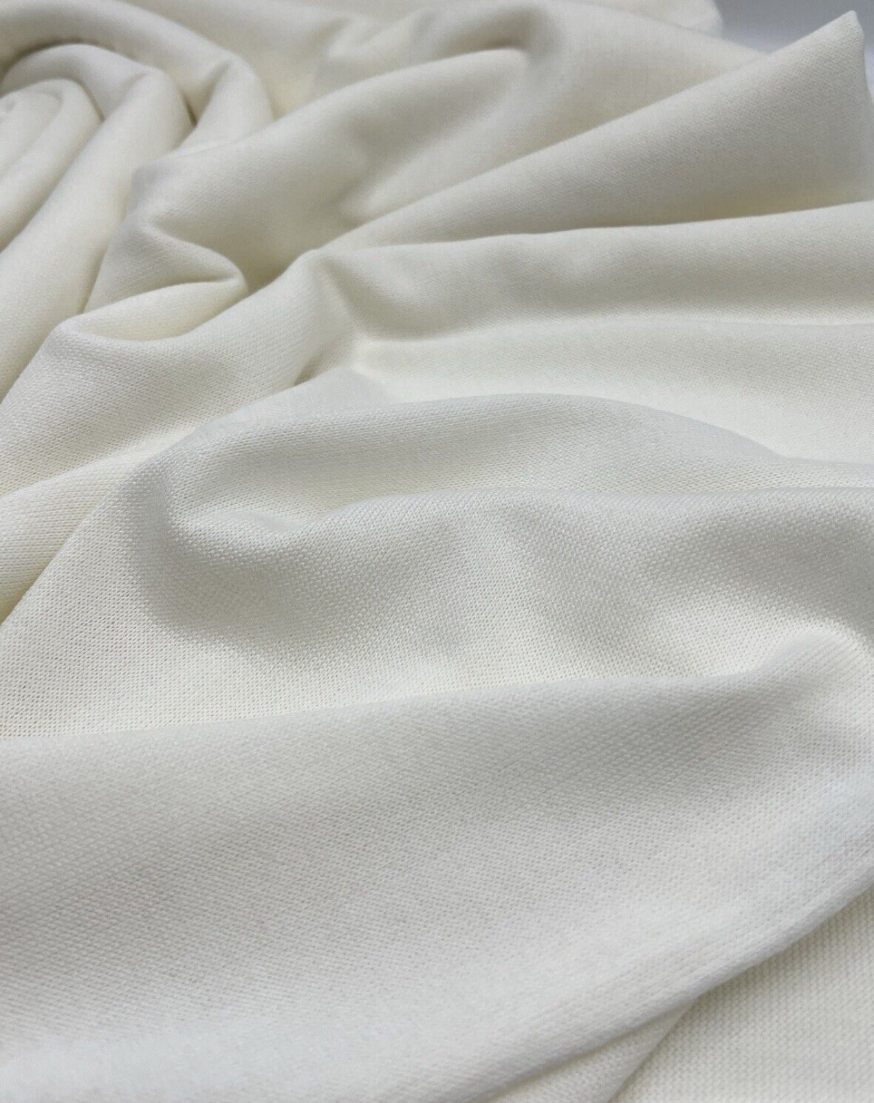 Ivory Melange Knit Stretch Fabric