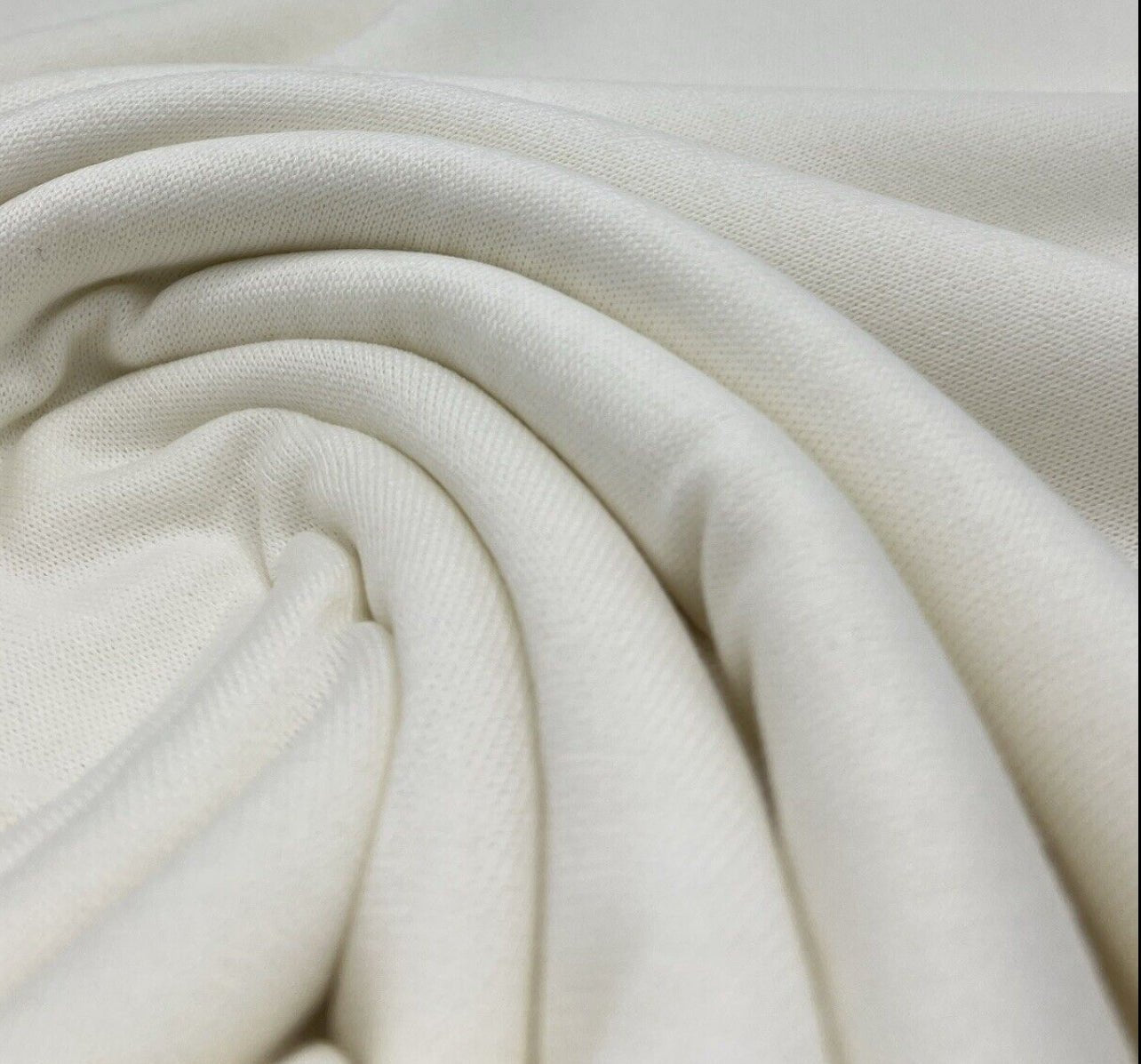 Ivory Melange Knit Stretch Fabric