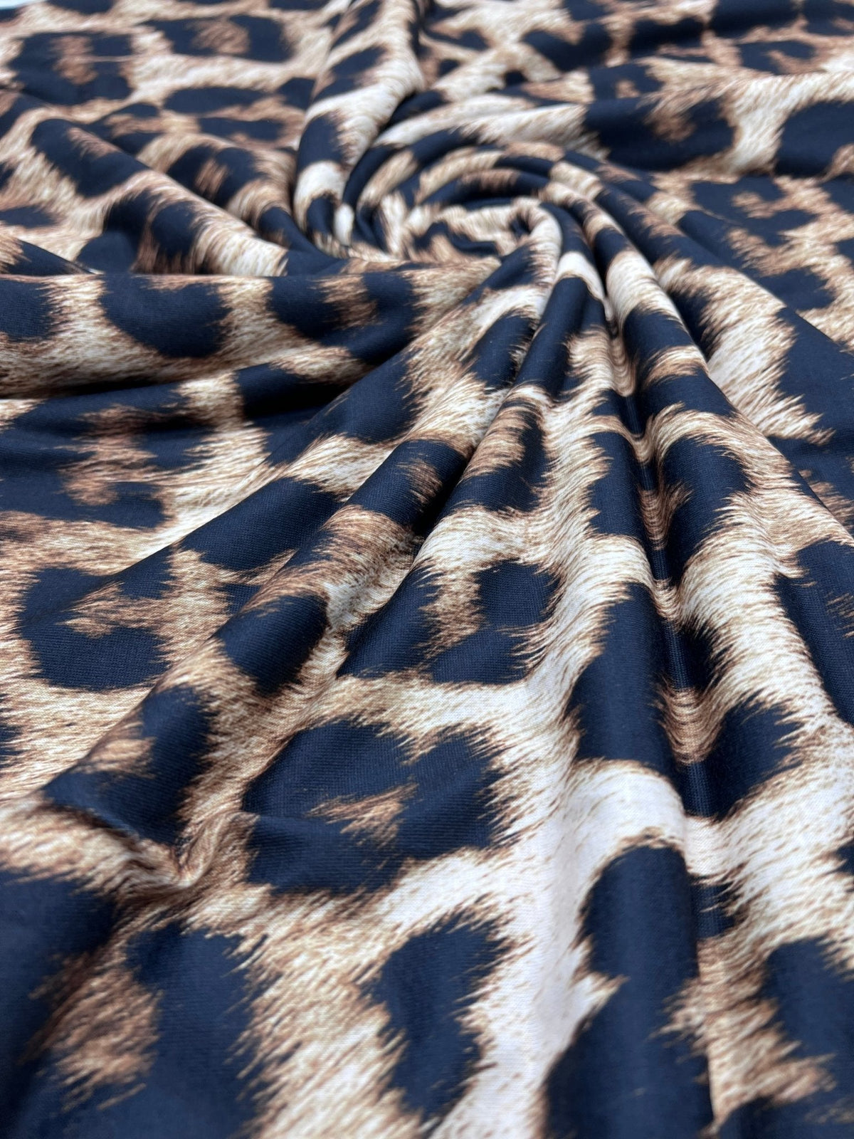 Large Leopard Print Spun Poly Stretch Fabric