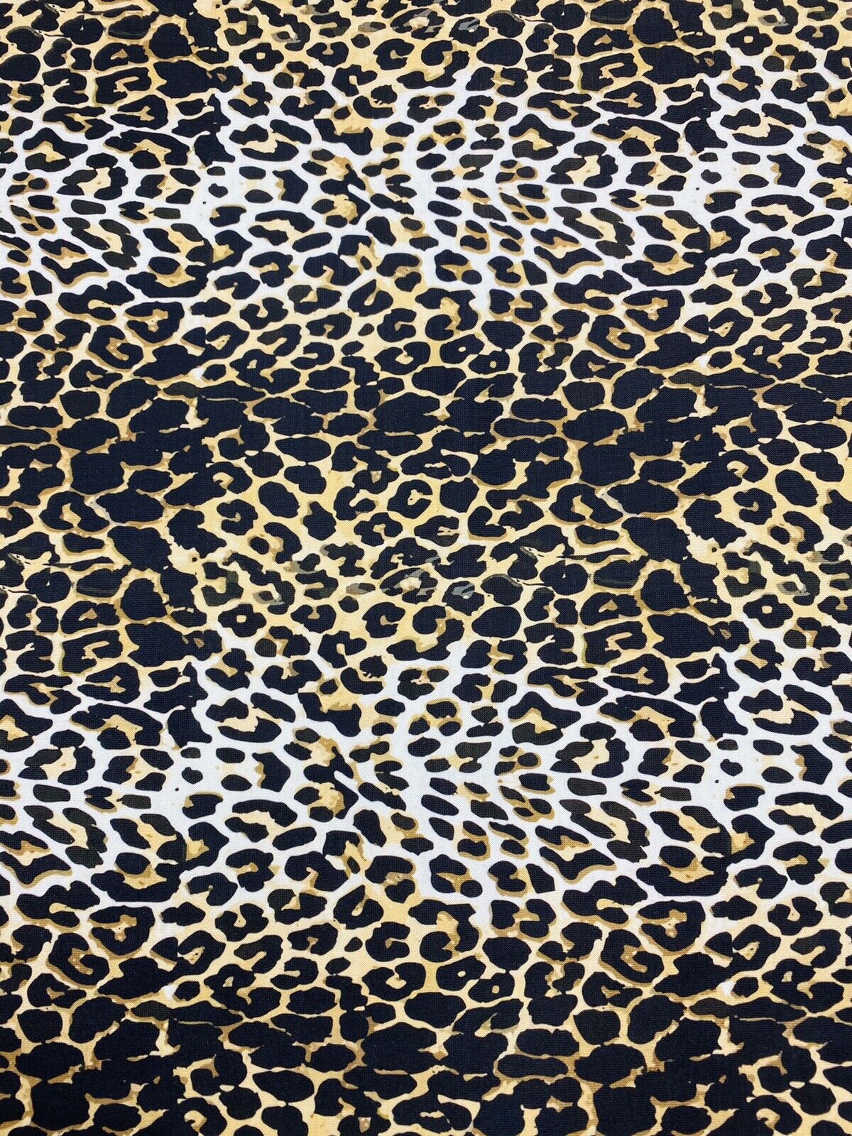 Leopard White Print Spun Poly Stretch Fabric