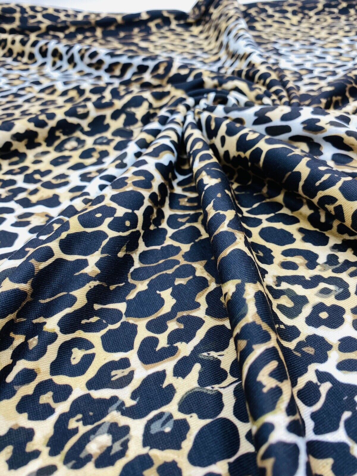 Leopard White Print Spun Poly Stretch Fabric