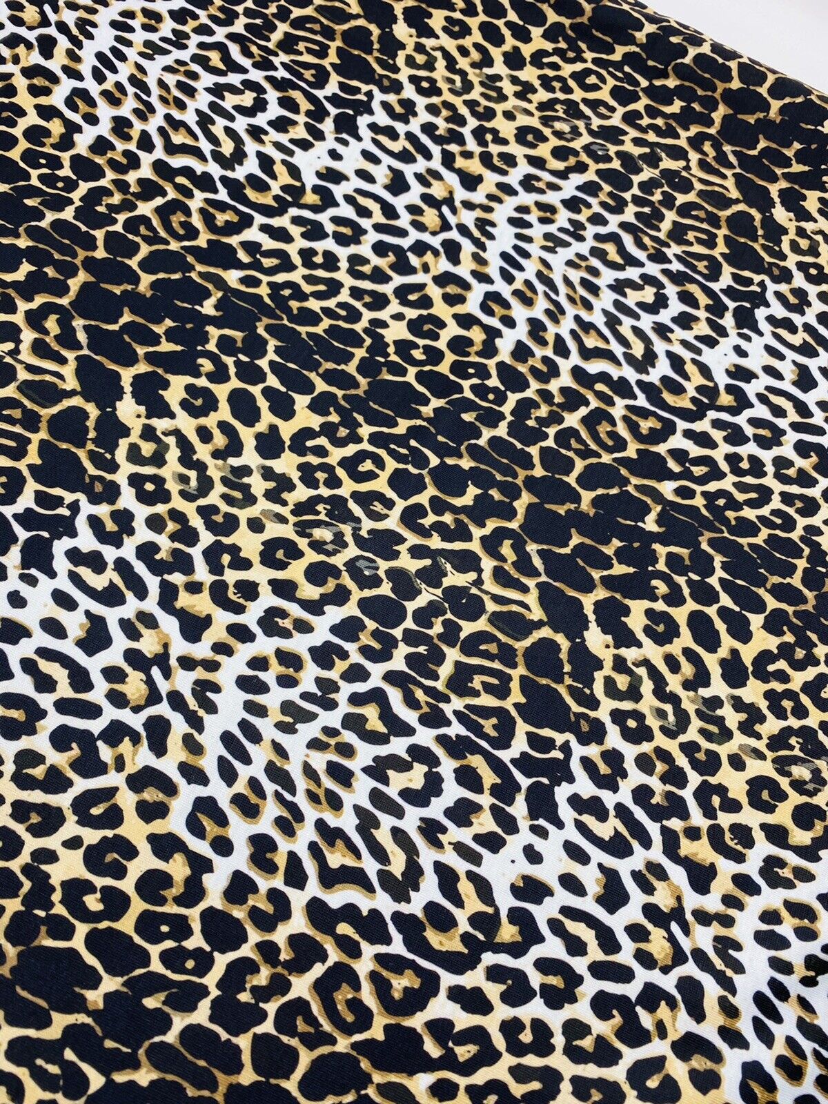 Leopard White Print Spun Poly Stretch Fabric