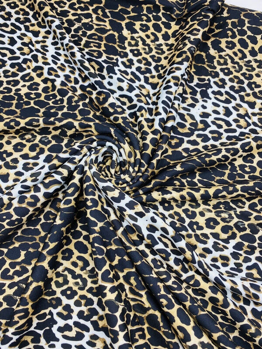 Leopard White Print Spun Poly Stretch Fabric