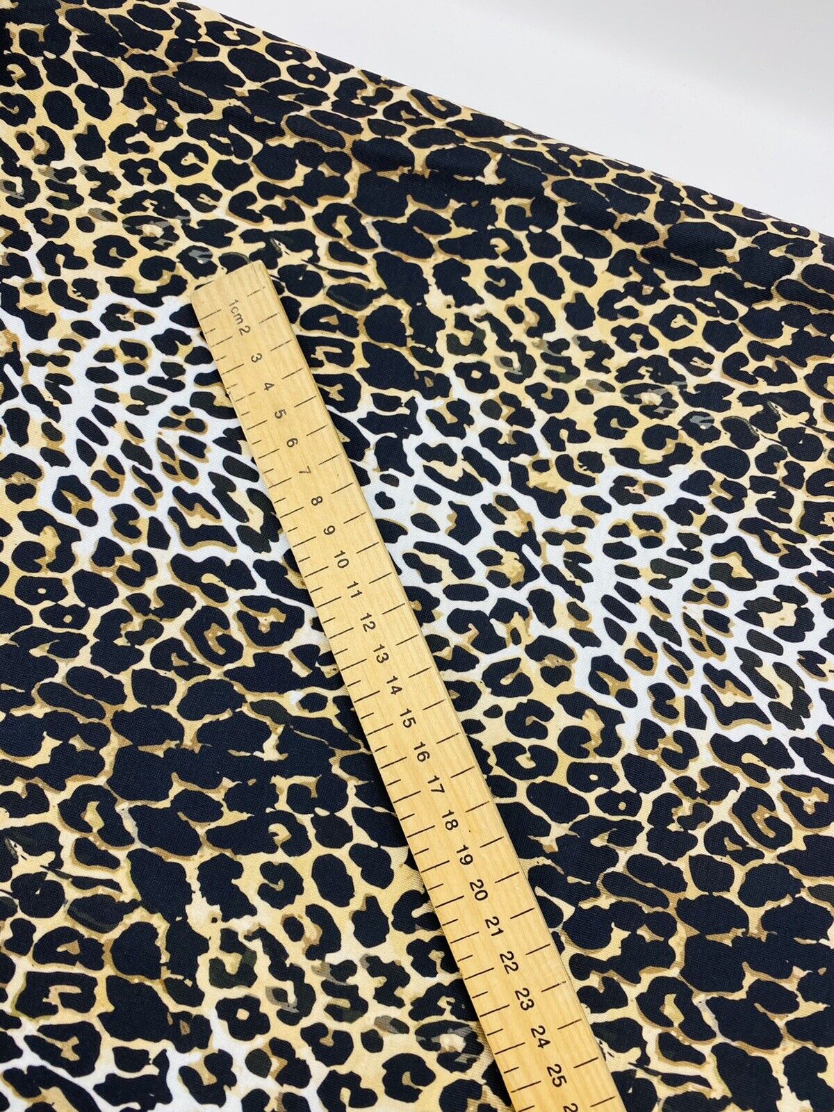 Leopard White Print Spun Poly Stretch Fabric
