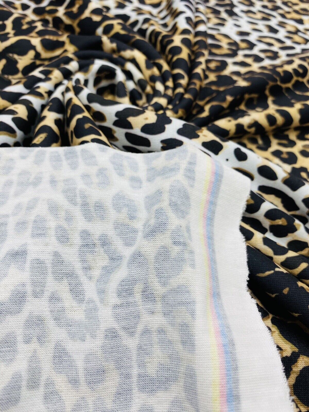 Leopard White Print Spun Poly Stretch Fabric