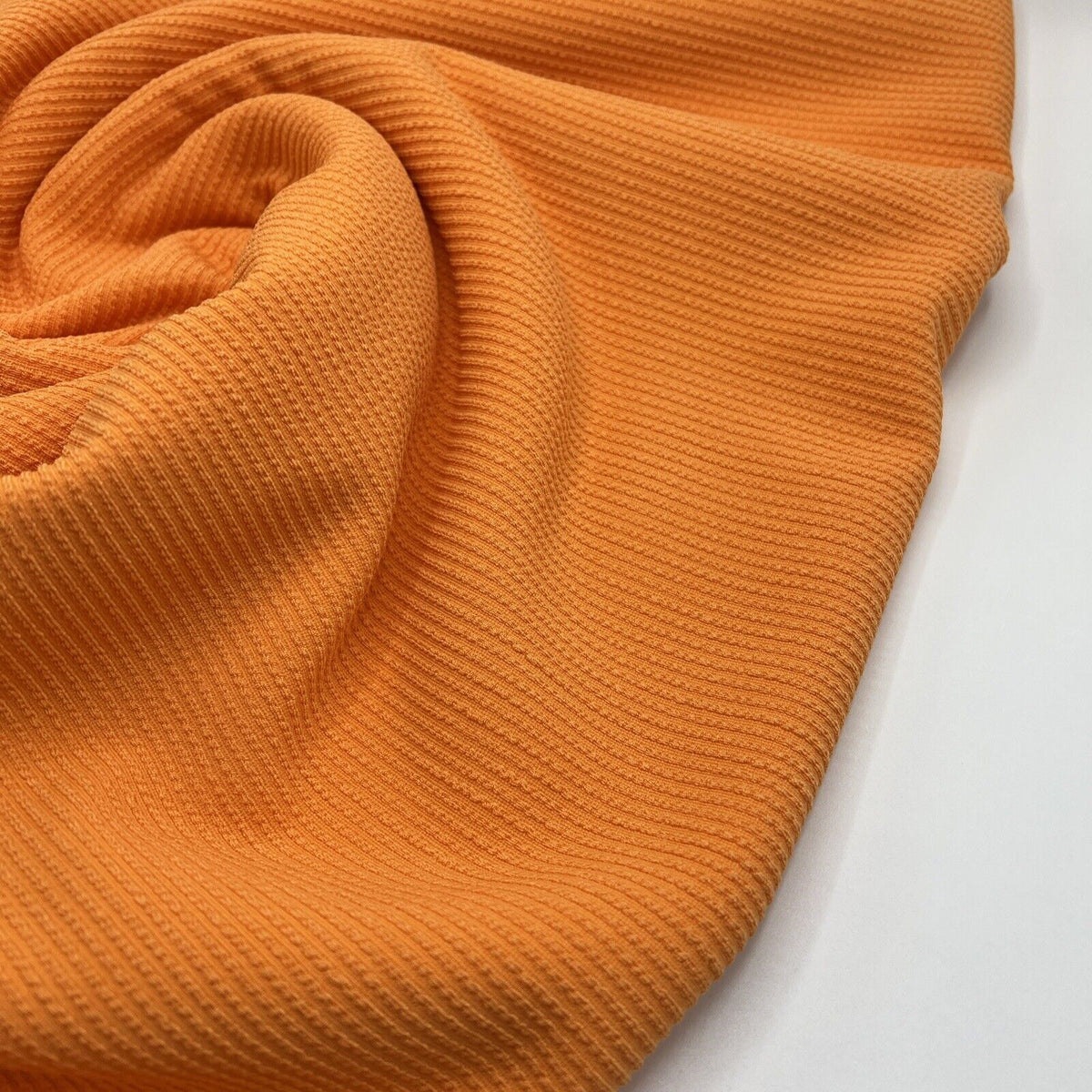 Light Orange Crinkle Rib Stretch Fabric