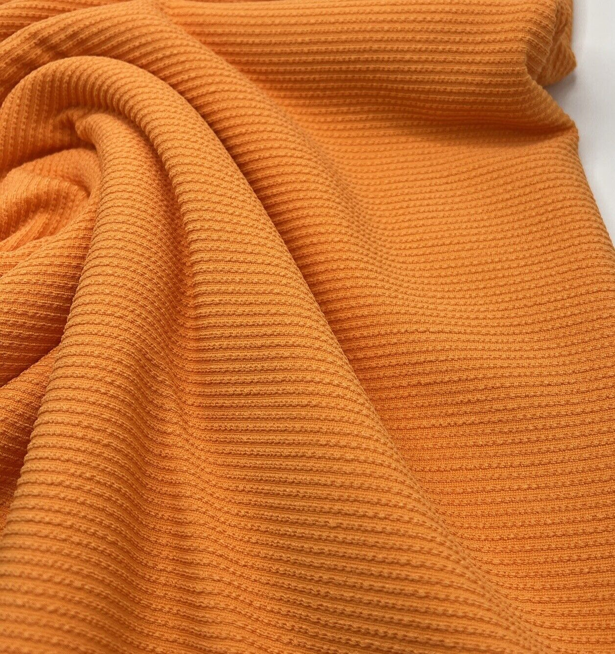 Light Orange Crinkle Rib Stretch Fabric