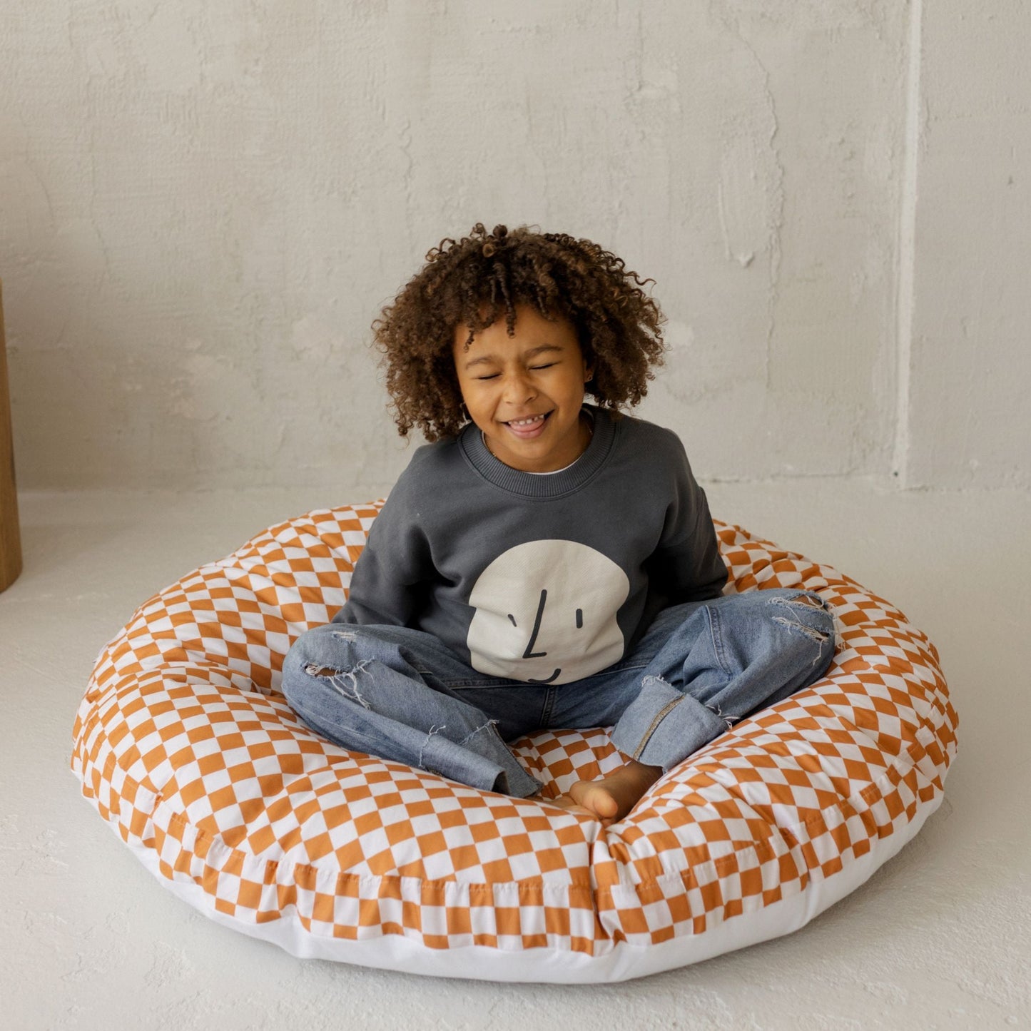 MINICAMP Checkered Large Kids Floor Cushion in Off-white and Orange