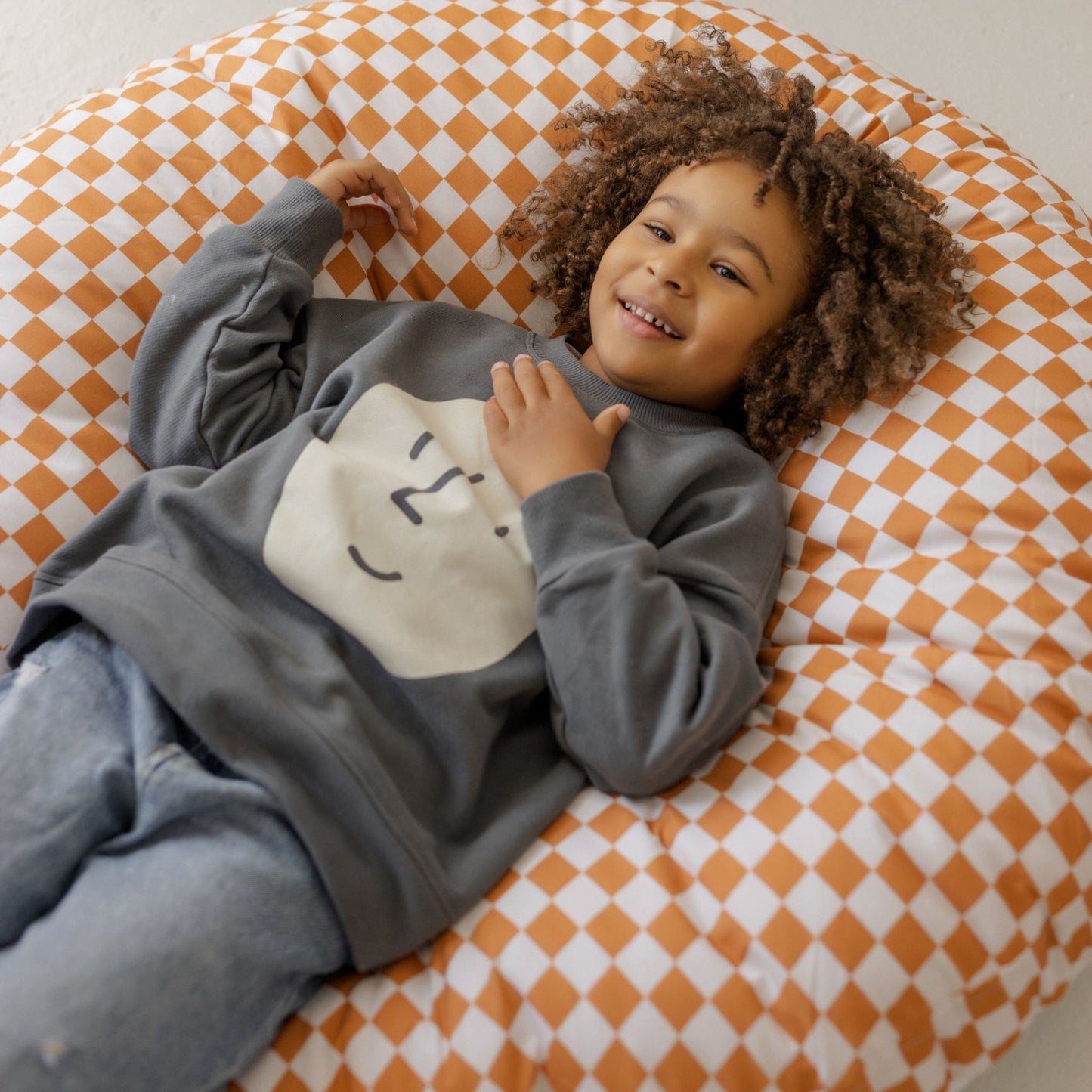 MINICAMP Checkered Large Kids Floor Cushion in Off-white and Orange
