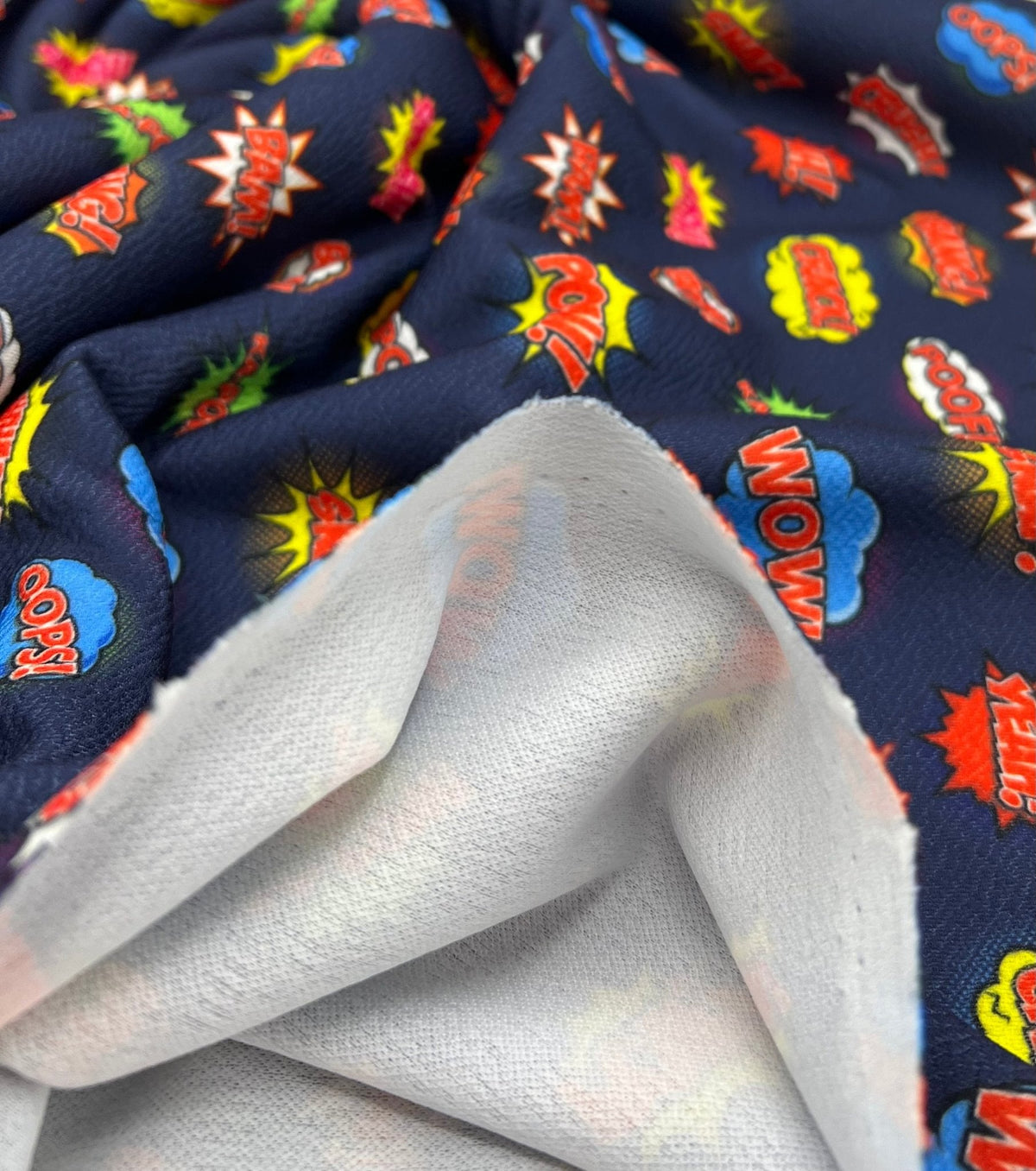 Navy Comic Print Liverpool Bullet Stretch Fabric