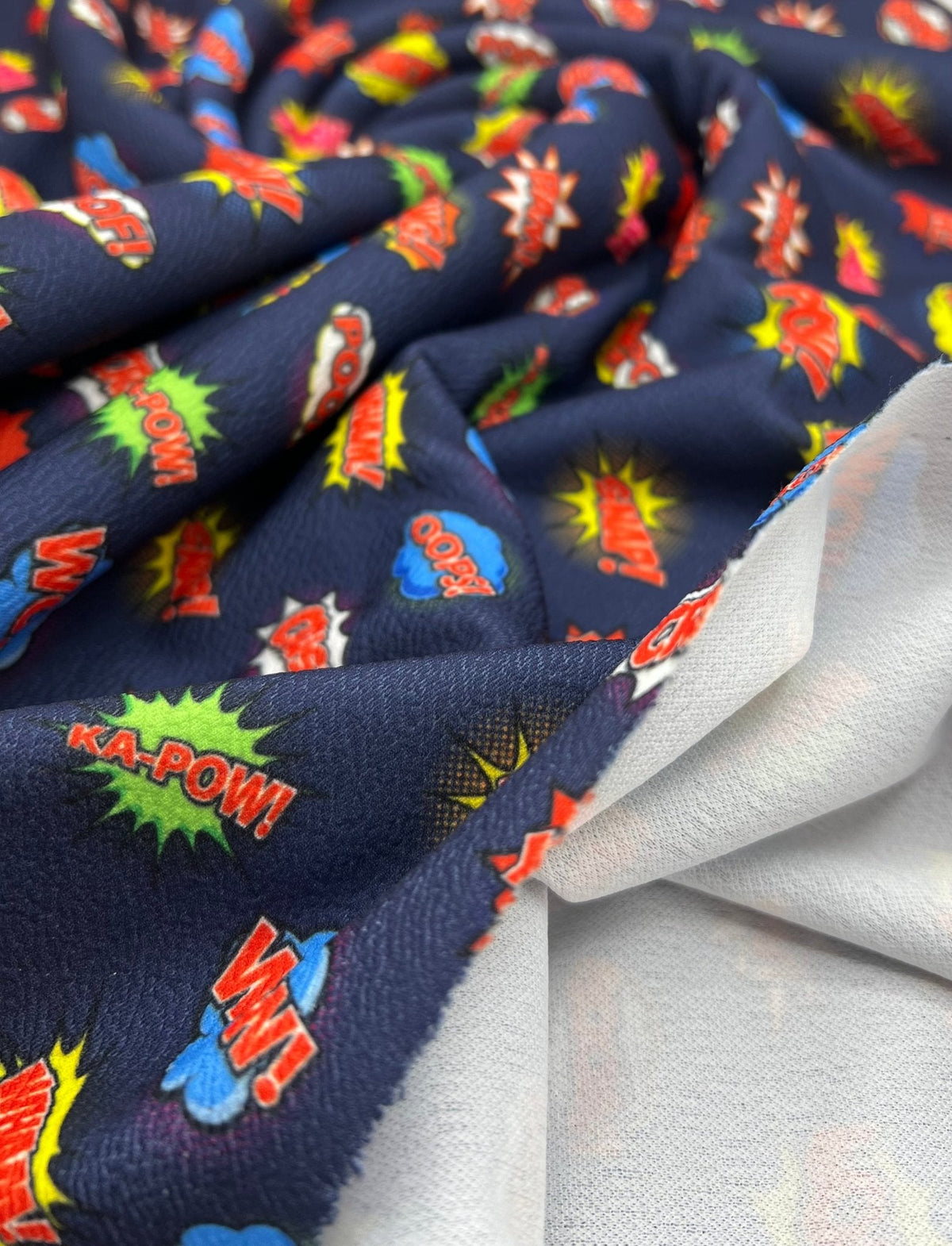 Navy Comic Print Liverpool Bullet Stretch Fabric