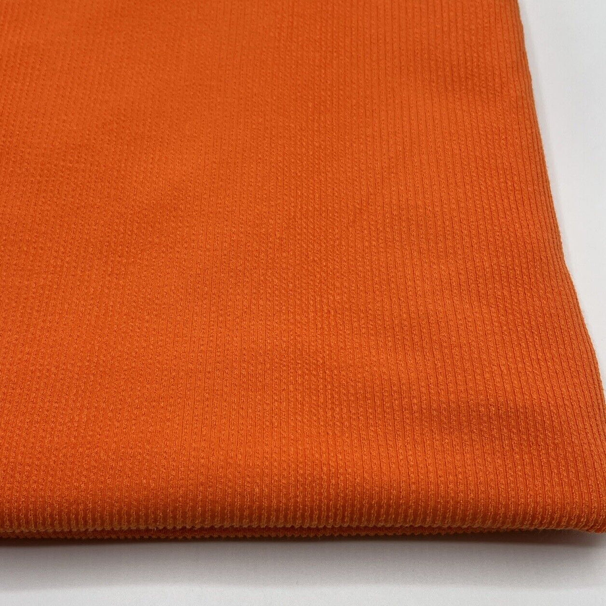 Neon Orange Crinkle Rib Stretch Fabric