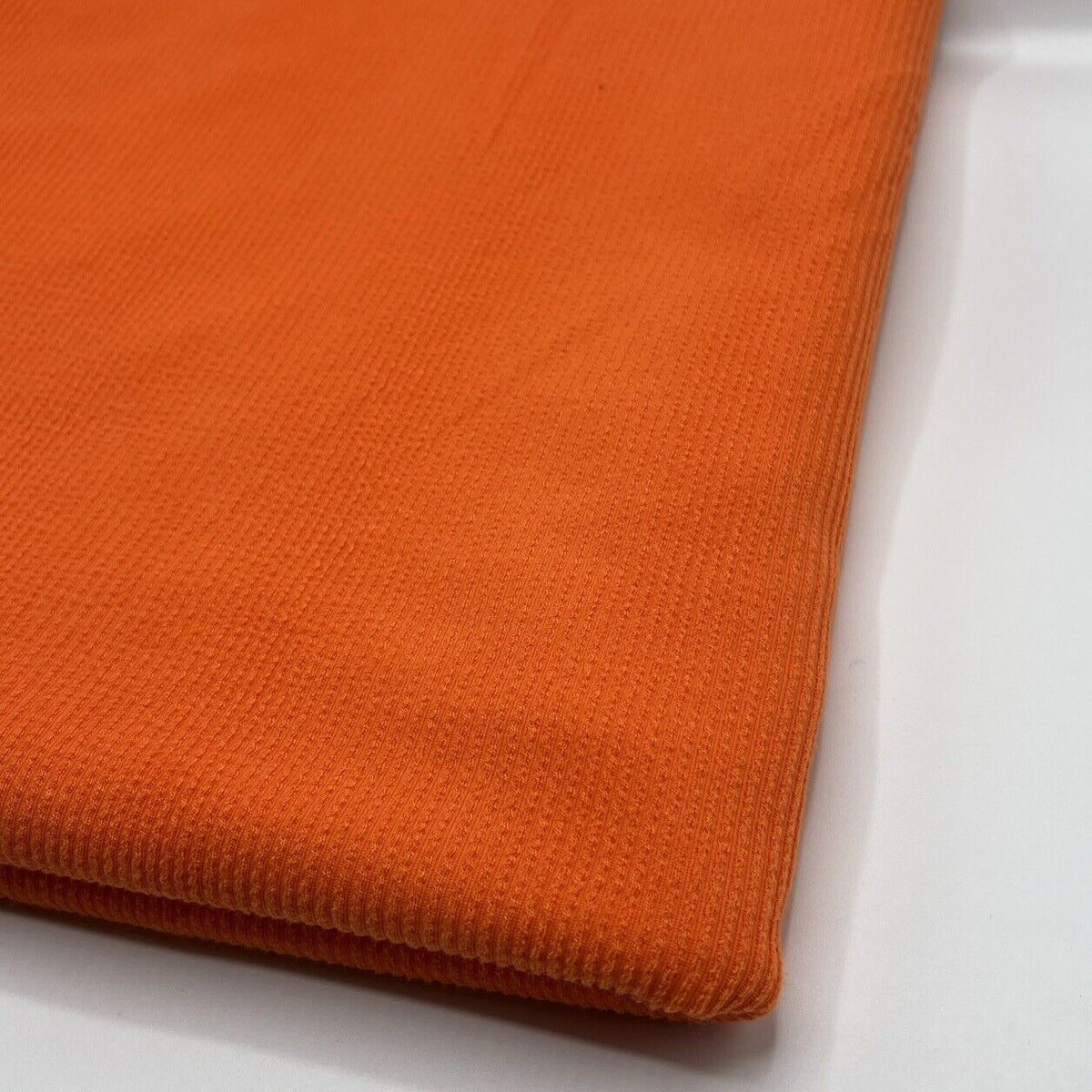 Neon Orange Crinkle Rib Stretch Fabric