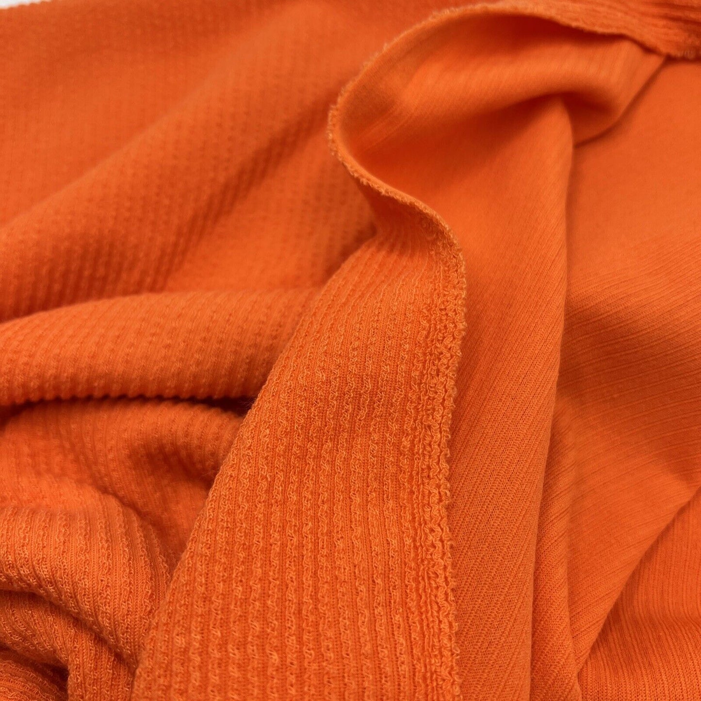 Neon Orange Crinkle Rib Stretch Fabric