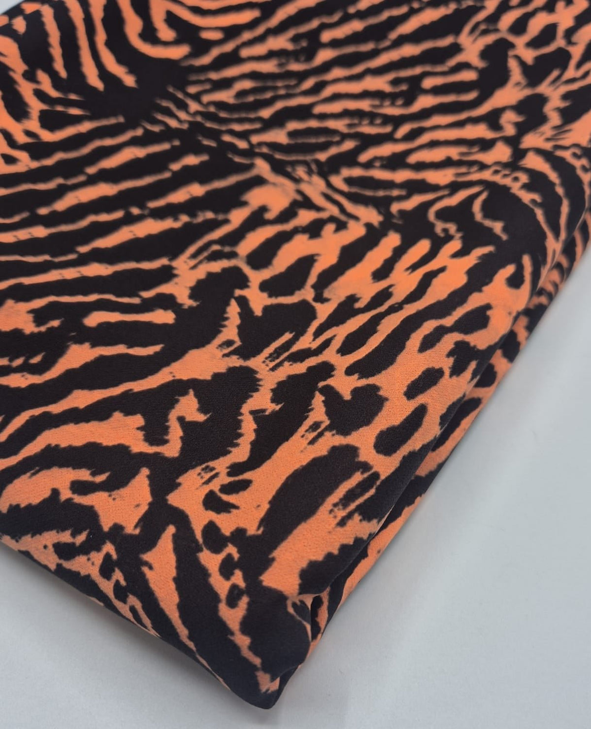 Orange Animal Neon Back Printed Scuba Crepe Fabric 4 Way Stretch