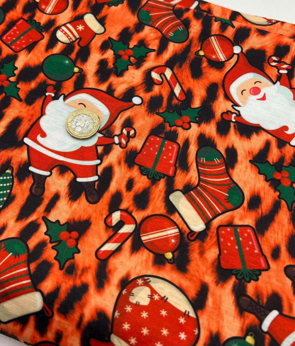 Orange Animal Santa Print Soft Spun Poly Stretch Fabric