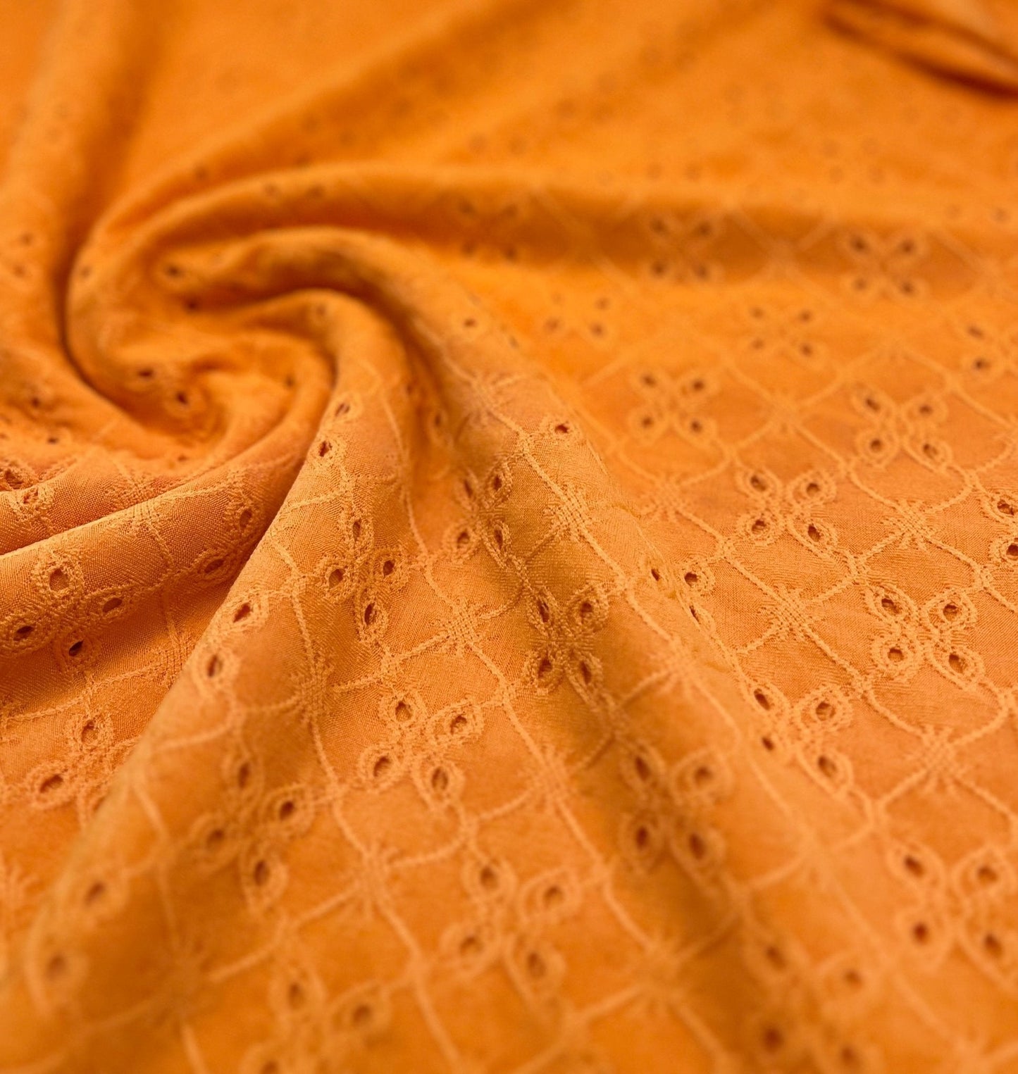 Orange Broderie Anglaise Stretch Fabric 4 Way Stretch Fabric