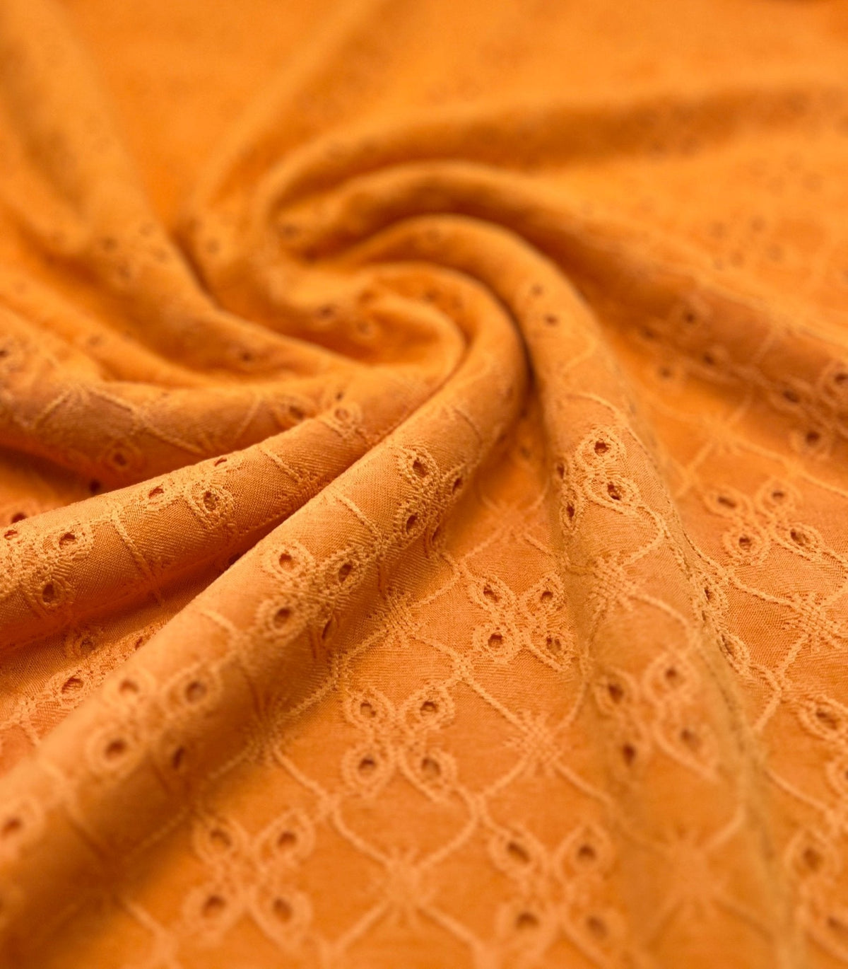 Orange Broderie Anglaise Stretch Fabric 4 Way Stretch Fabric