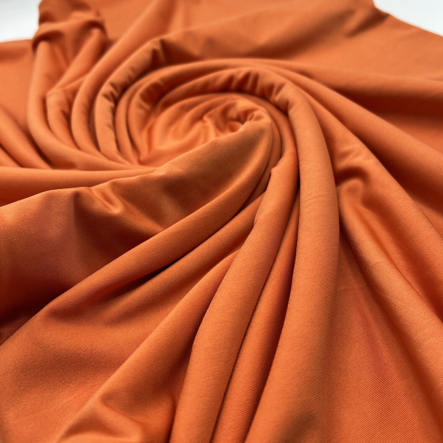 Orange Plain Shiny Soft Touch Slinky 4 Way Stretch Fabric