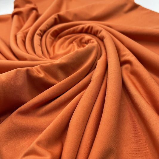 Orange Plain Shiny Soft Touch Slinky 4 Way Stretch Fabric