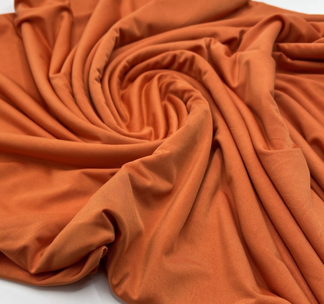 Orange Plain Shiny Soft Touch Slinky 4 Way Stretch Fabric