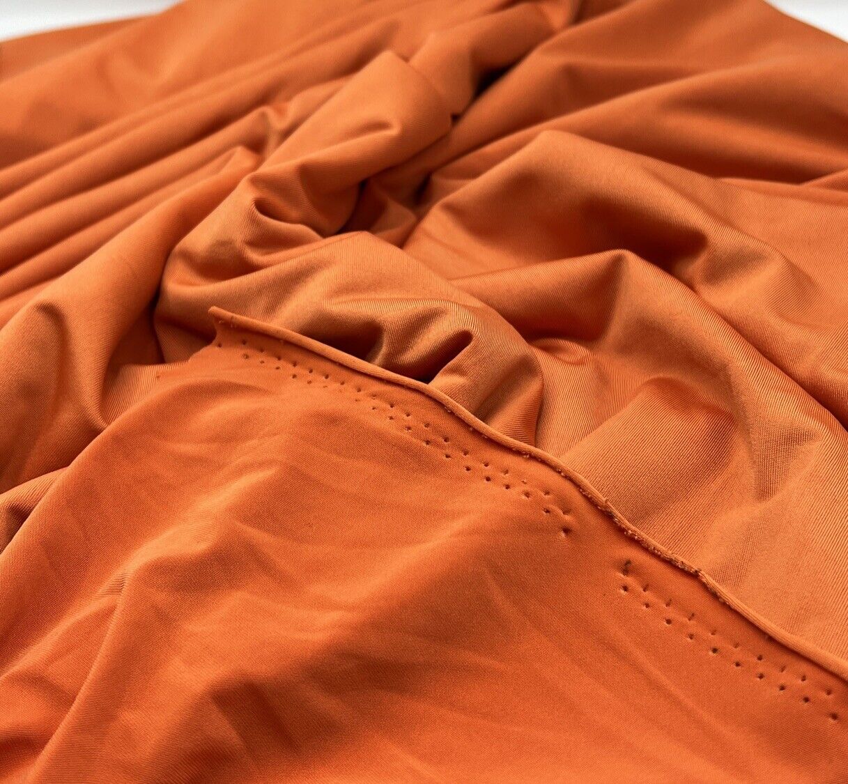 Orange Plain Shiny Soft Touch Slinky 4 Way Stretch Fabric