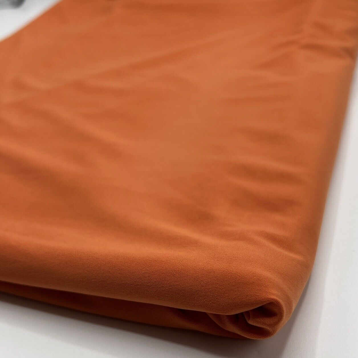 Orange Plain Shiny Soft Touch Slinky 4 Way Stretch Fabric