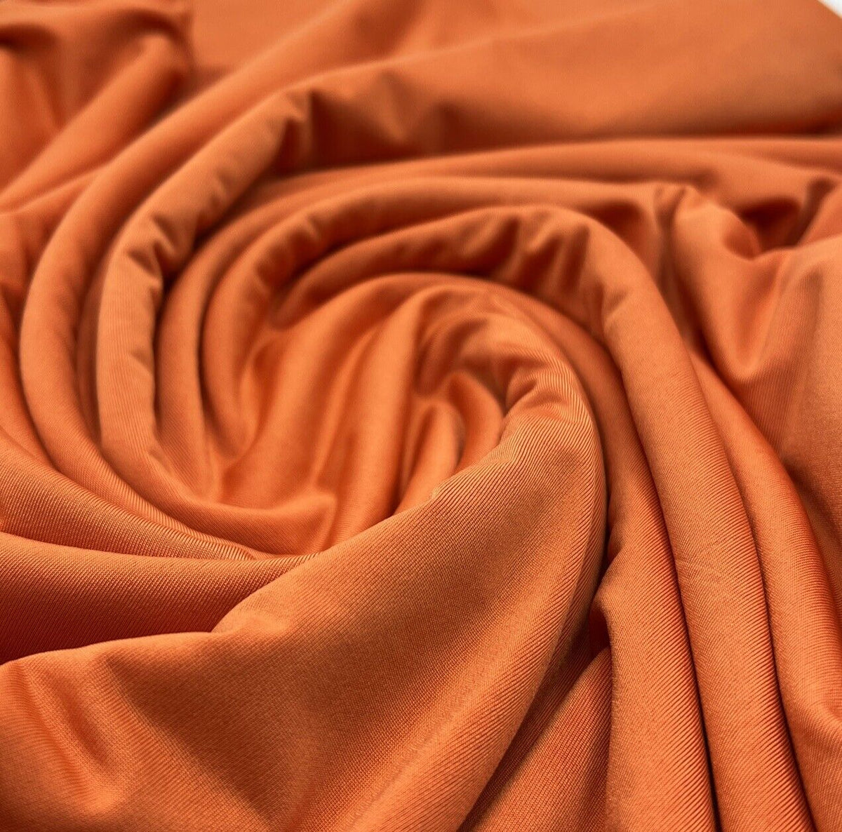 Orange Plain Shiny Soft Touch Slinky 4 Way Stretch Fabric