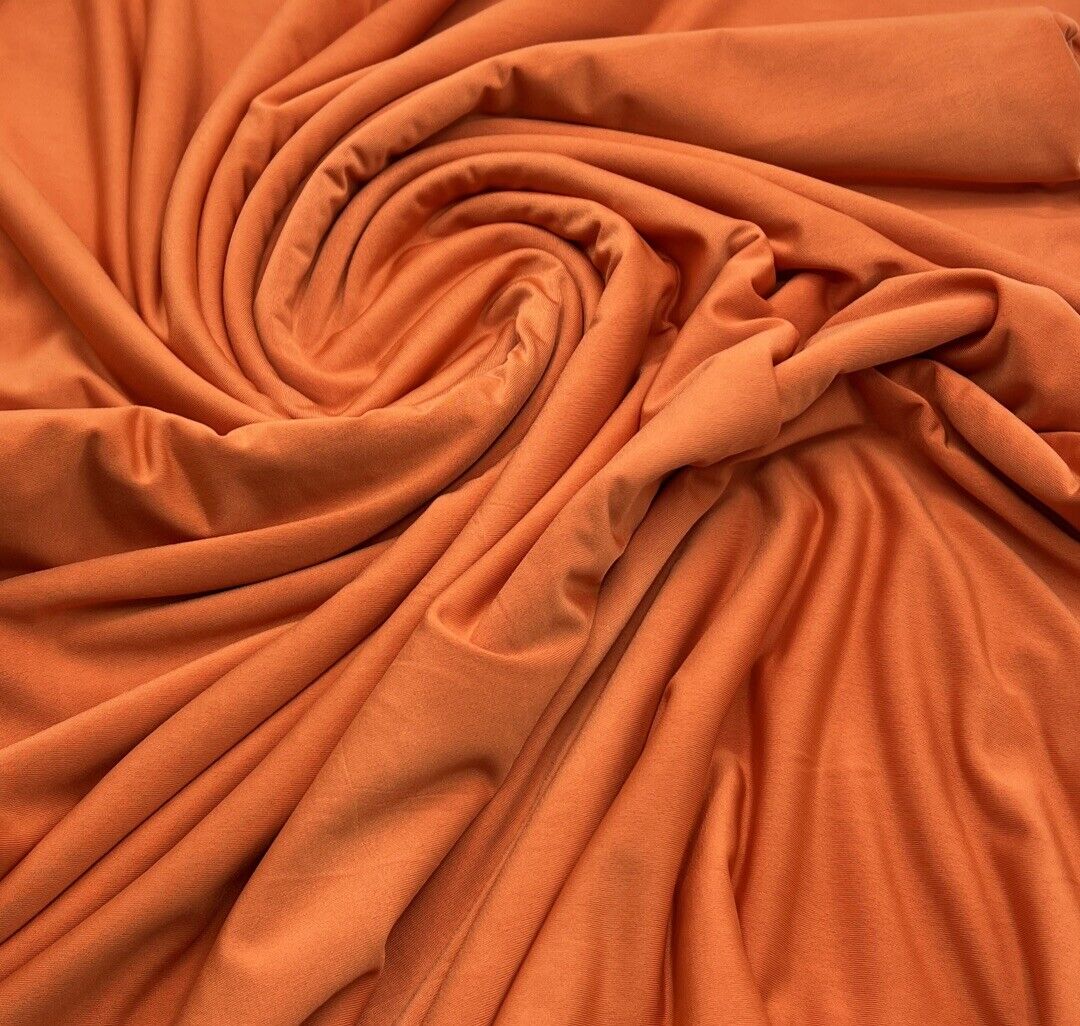 Orange Plain Shiny Soft Touch Slinky 4 Way Stretch Fabric