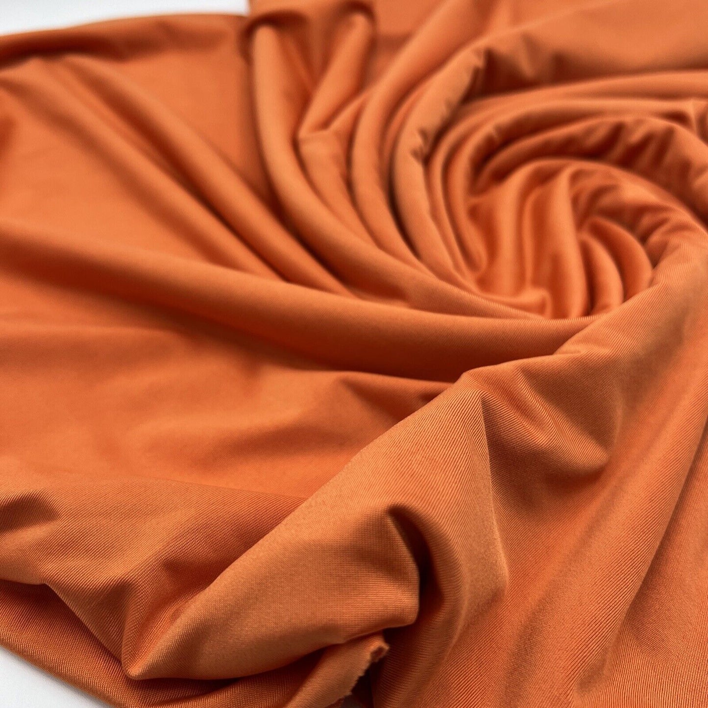 Orange Plain Shiny Soft Touch Slinky 4 Way Stretch Fabric