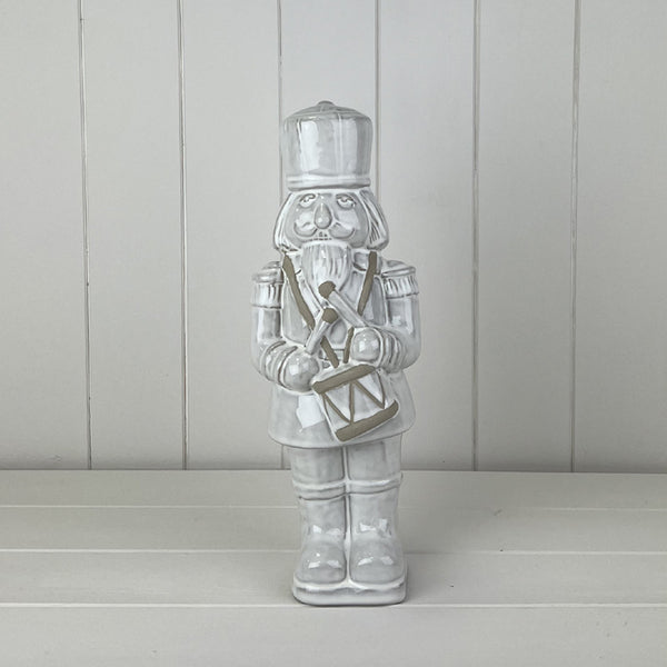 Glazed Ceramic Nutcracker Ornament With Textured Detail