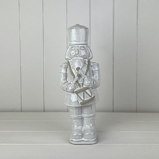 Glazed Ceramic Nutcracker Ornament With Textured Detail