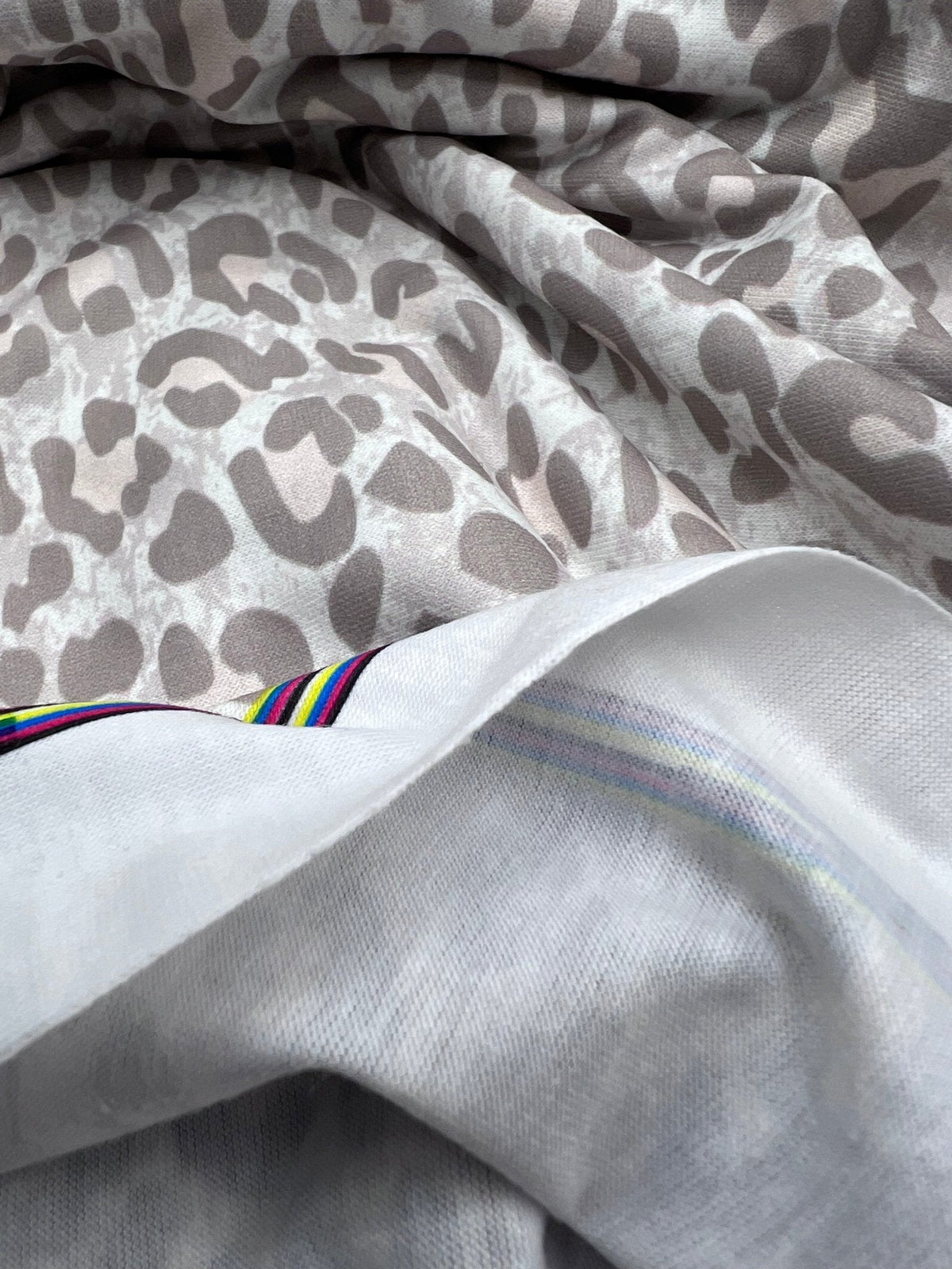 Pale Fade Animal Print Spun Poly Stretch Fabric