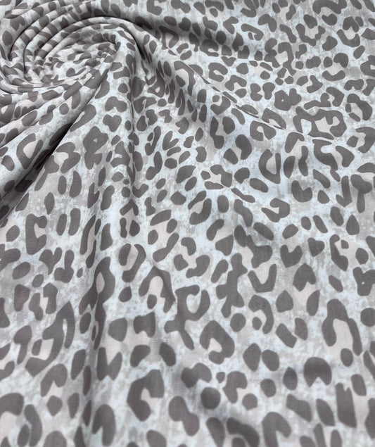 Pale Fade Animal Print Spun Poly Stretch Fabric