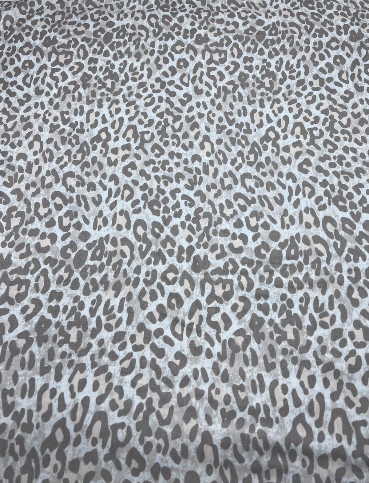 Pale Fade Animal Print Spun Poly Stretch Fabric