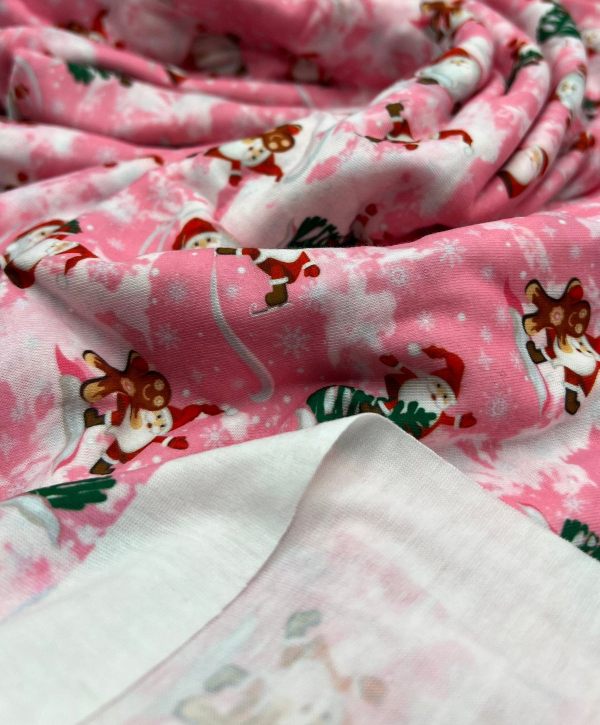 Pink Santa Print Soft Spun Poly Stretch Fabric