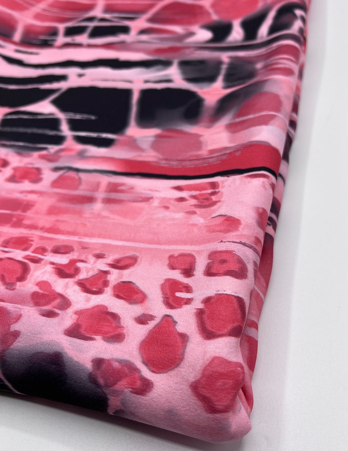 Pink Snake Printed Scuba Crepe Jersey Fabric 4 Way Stretch