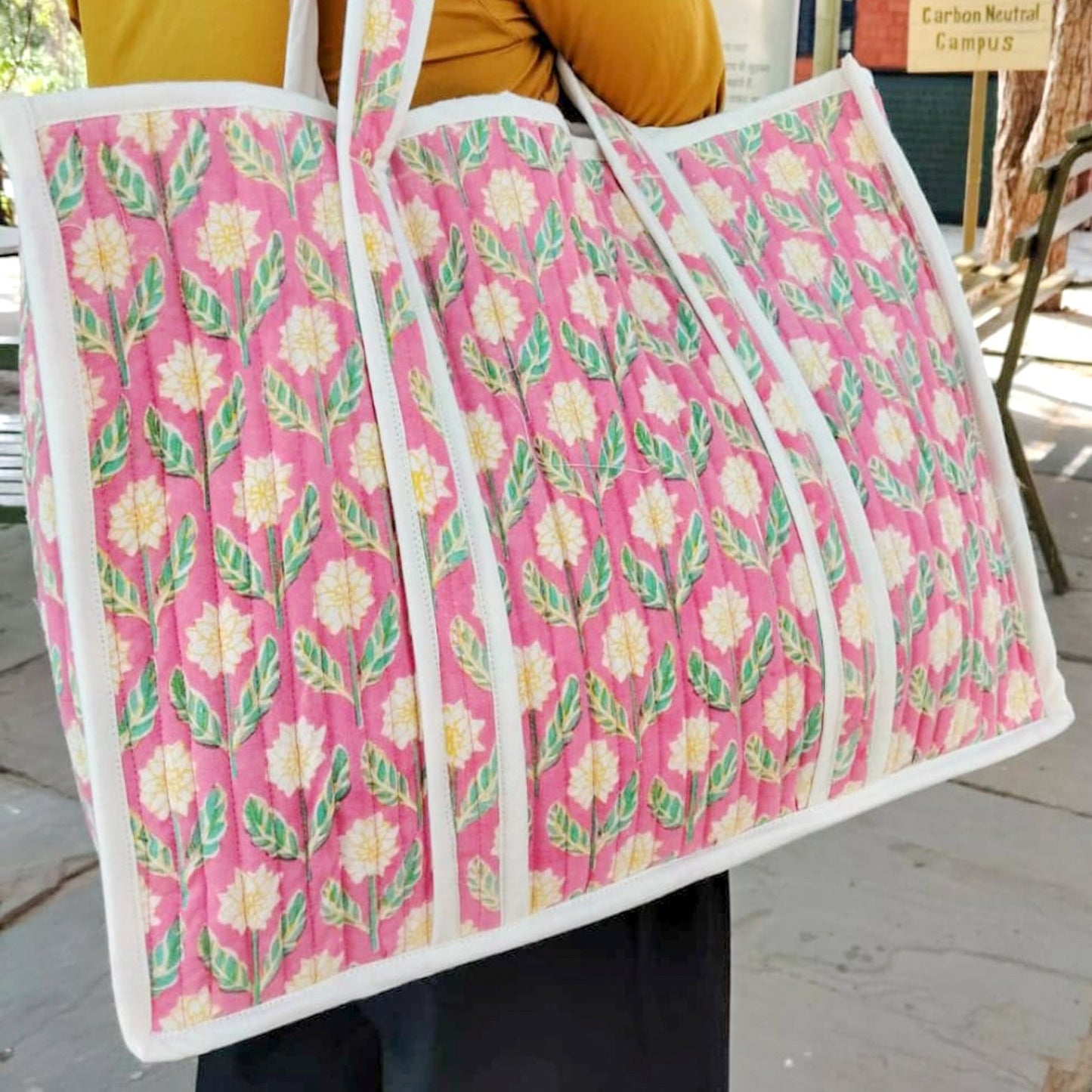 Large quilted weekend tote bag, vibrant pink block print, floral design