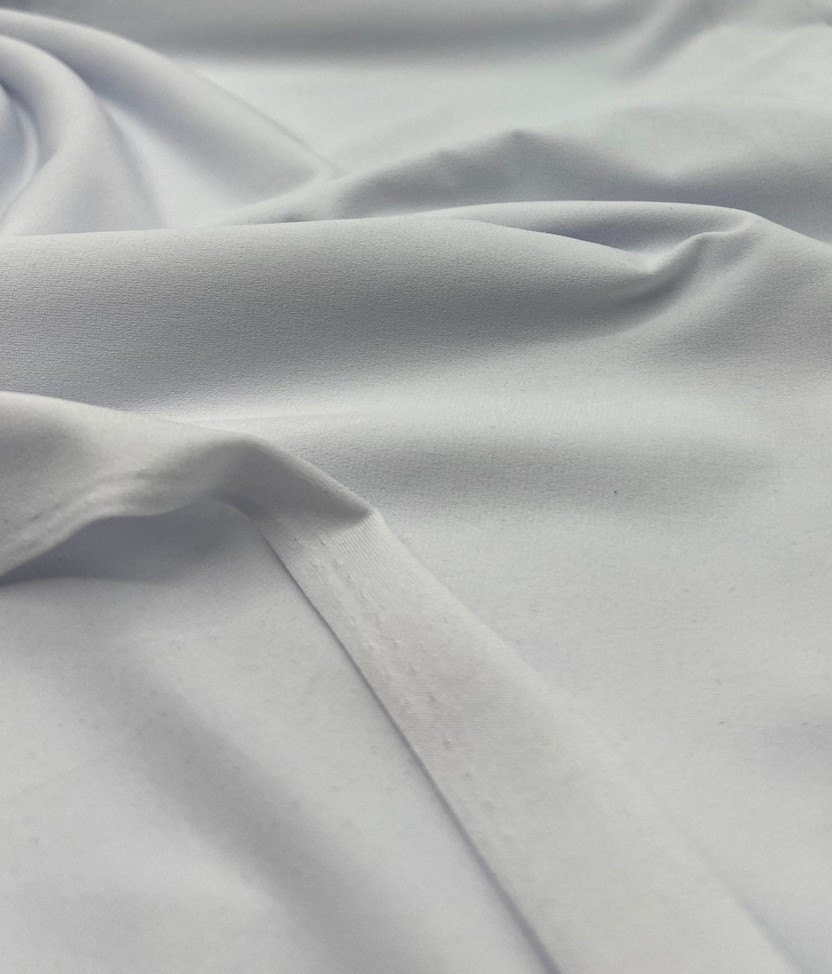 Plain White ITY 4 Way Stretch Fabric