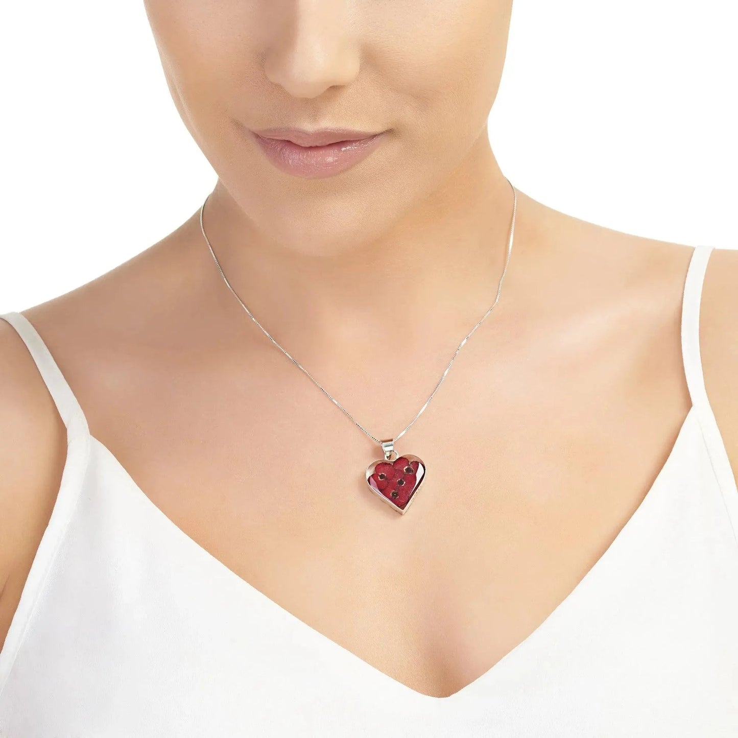 Poppy heart necklace by Shrieking Violet® Sterling silver pendant handmade with real flowers.