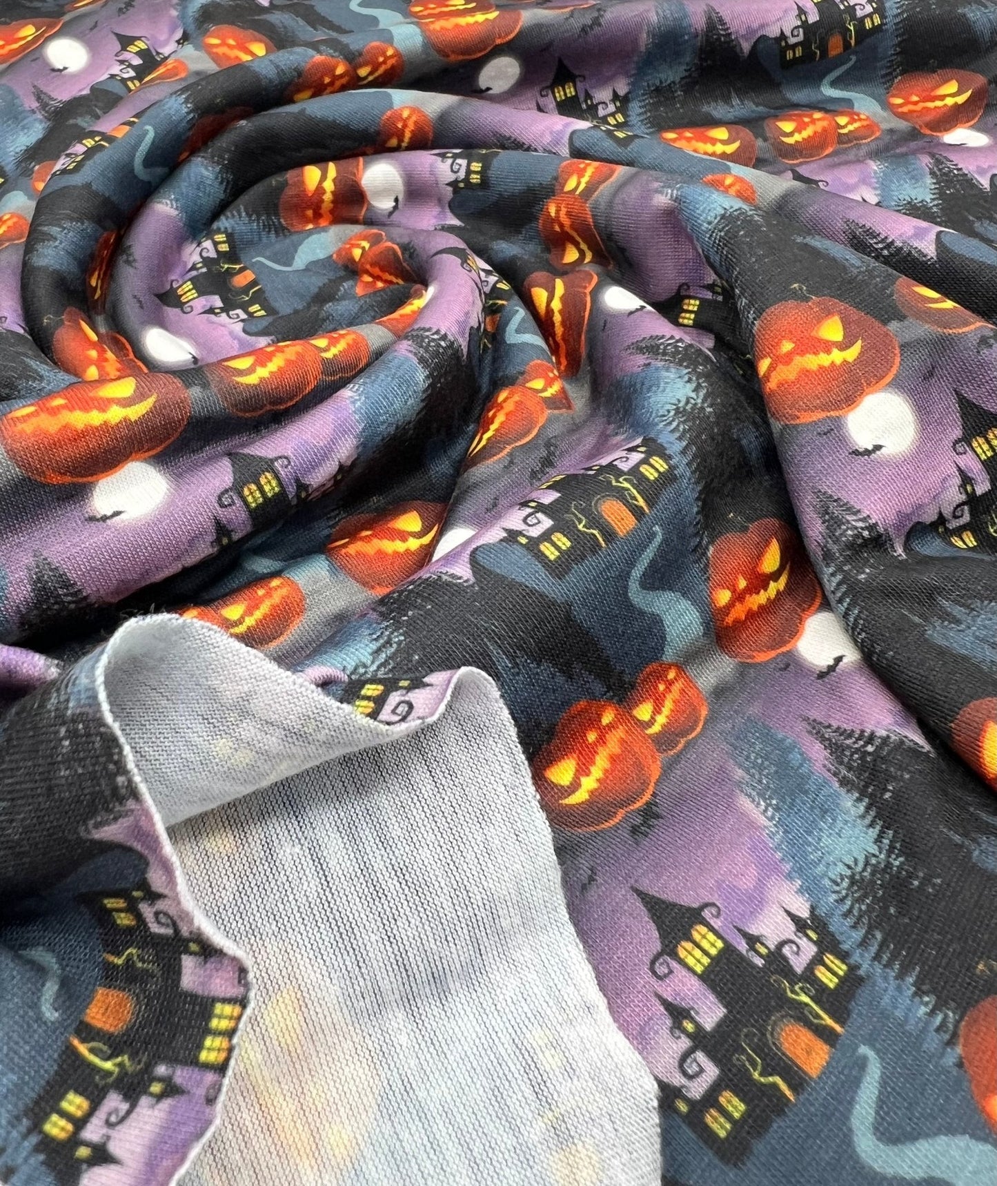 Purple Pumpkin Castle Halloween Print Spun Poly Stretch Fabric