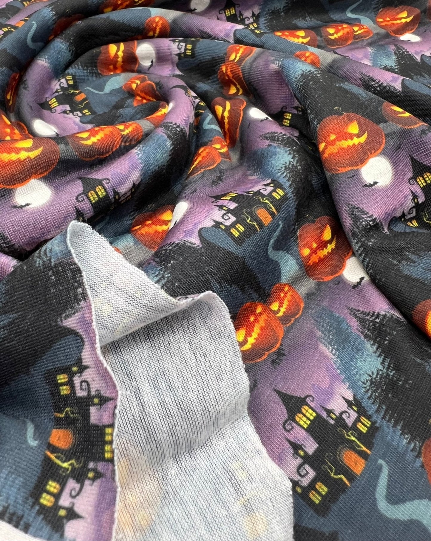 Purple Pumpkin Castle Halloween Print Spun Poly Stretch Fabric