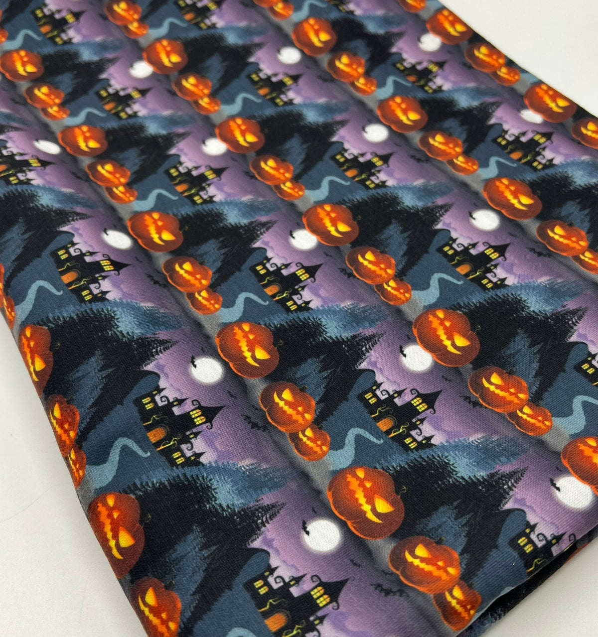 Purple Pumpkin Castle Halloween Print Spun Poly Stretch Fabric